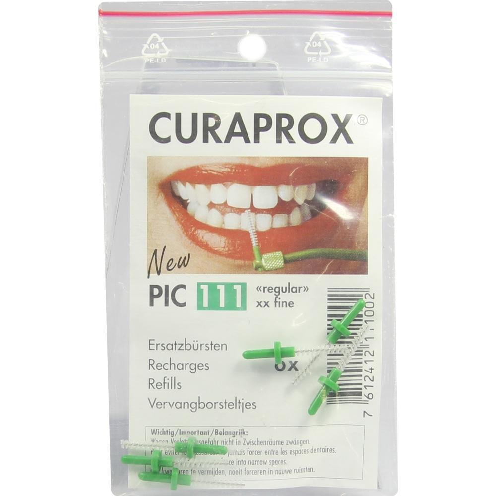 Eine Packung mit grünen Interdentalbürsten für die Zahnreinigung.