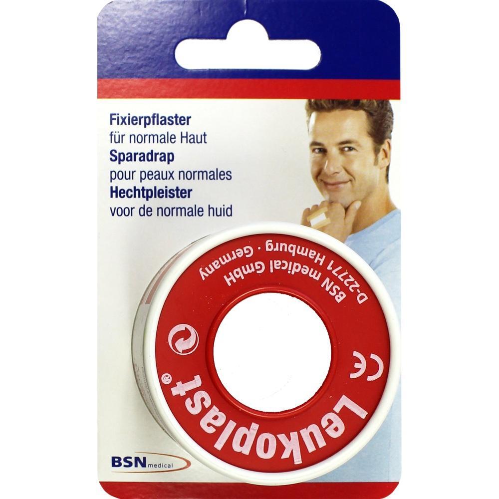 Eine Rolle rotes Fixierpflaster auf einer Verpackung.
