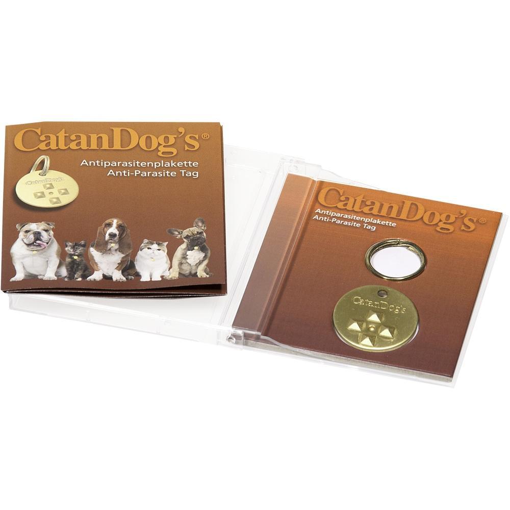 Verpackung einer Anti-Parasiten-Plakette für Haustiere mit goldener Plakette und Tierbildern.