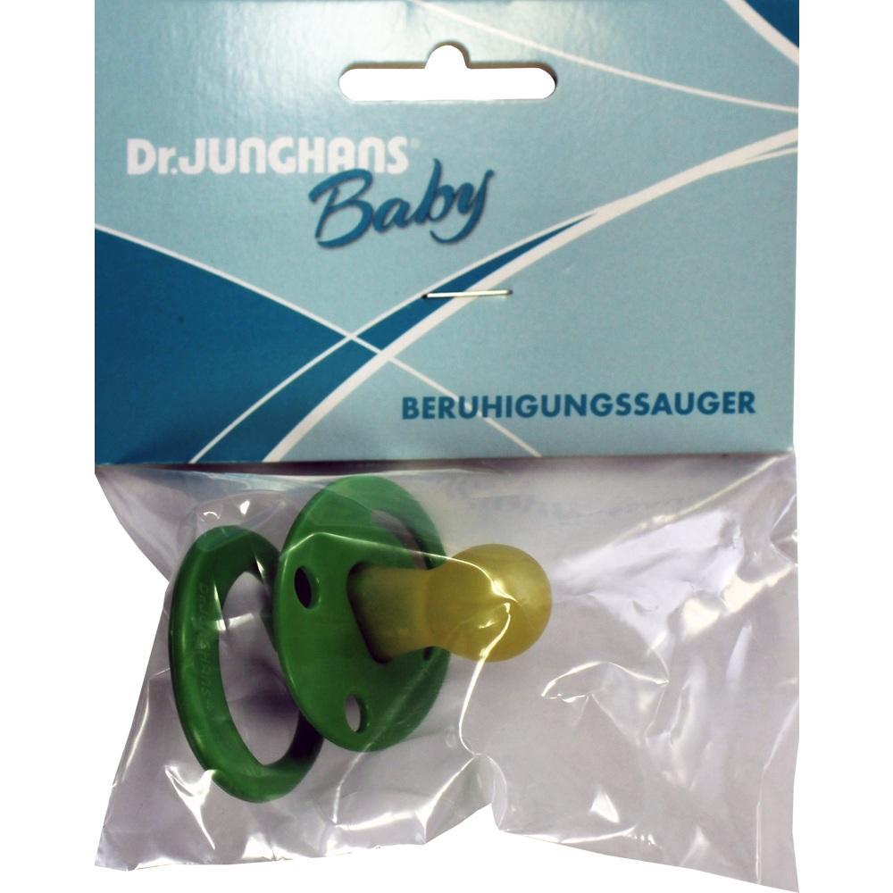 Ein grüner Babyschnuller in einer Plastikverpackung.