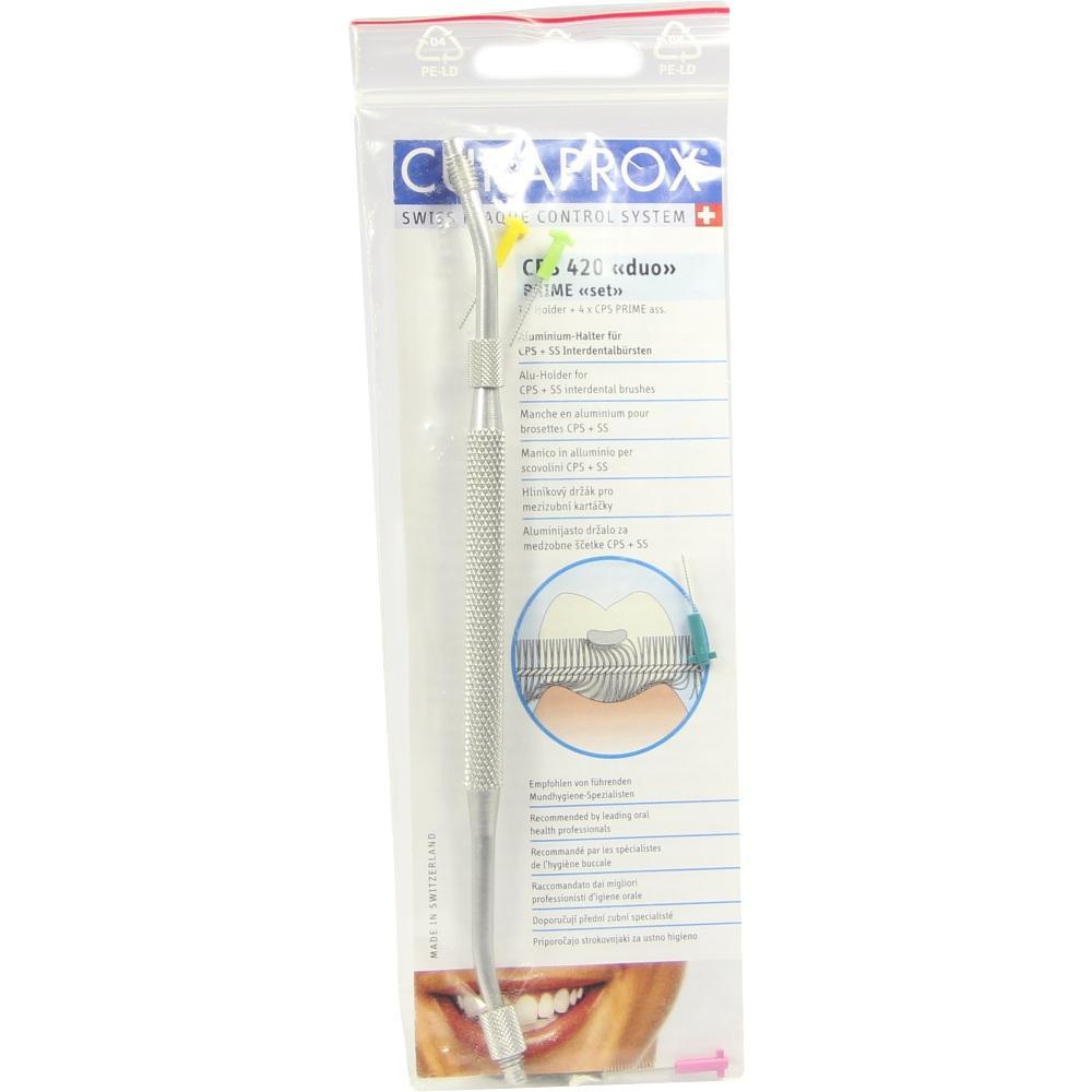 Verpackung mit Zahnzwischenraumbürste und metallischem Halter.