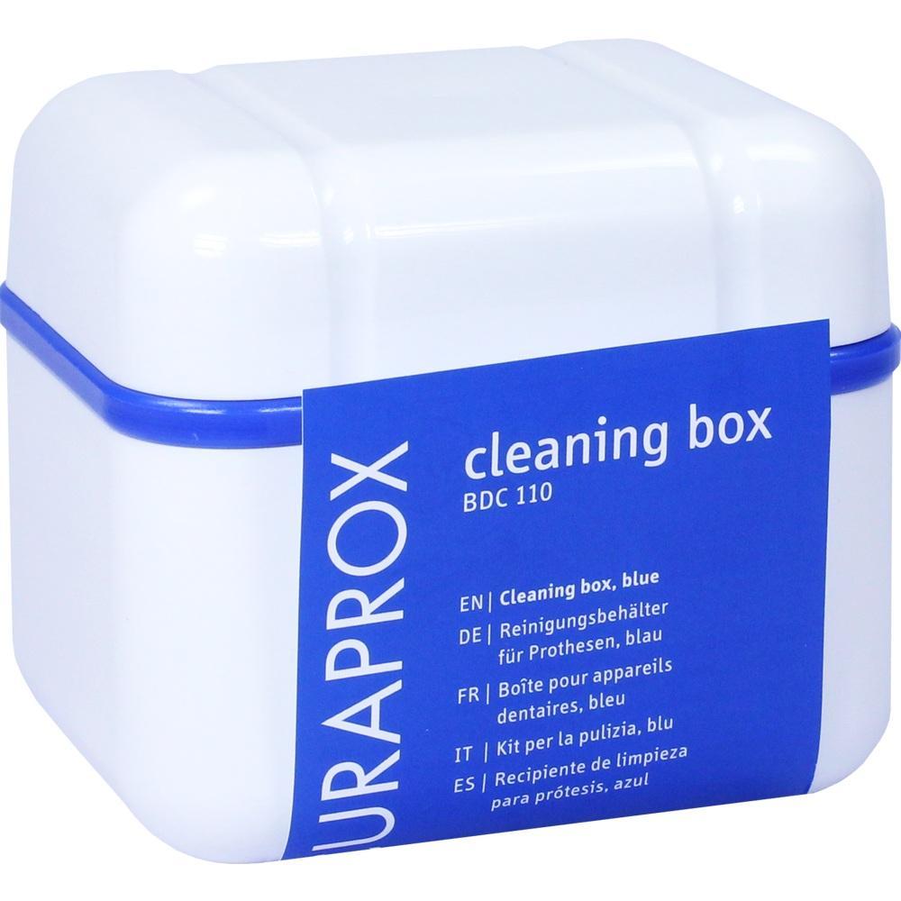Weiße Reinigungsbox mit blauem Etikett für Zahnprothesen.