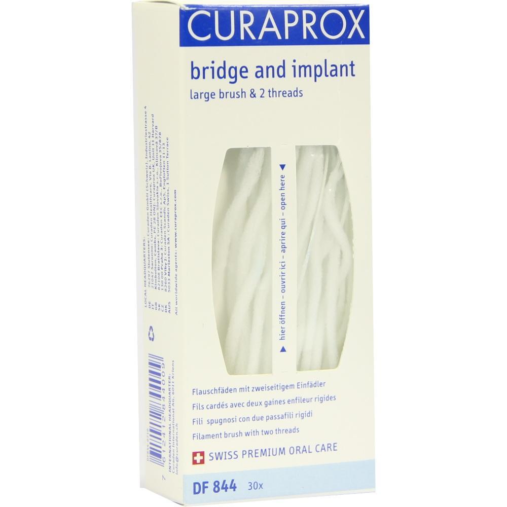 Weiße Verpackung einer Zahnpflegemarke mit Fäden für Brücken und Implantate.