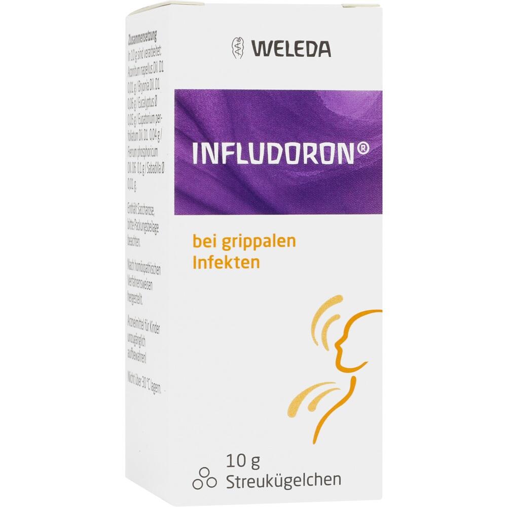 Weiße Verpackung mit lila Aufschrift "Infludoron" und "Streukügelchen bei grippalen Infekten".