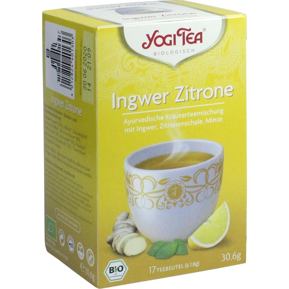 Gelbe Verpackung von Yogi Tea Ingwer Zitrone mit einer dampfenden Tasse Tee.