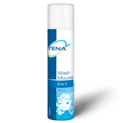 Eine weiße Dose mit blauem Etikett und der Aufschrift "Tena Wash Mousse 3-in-1".