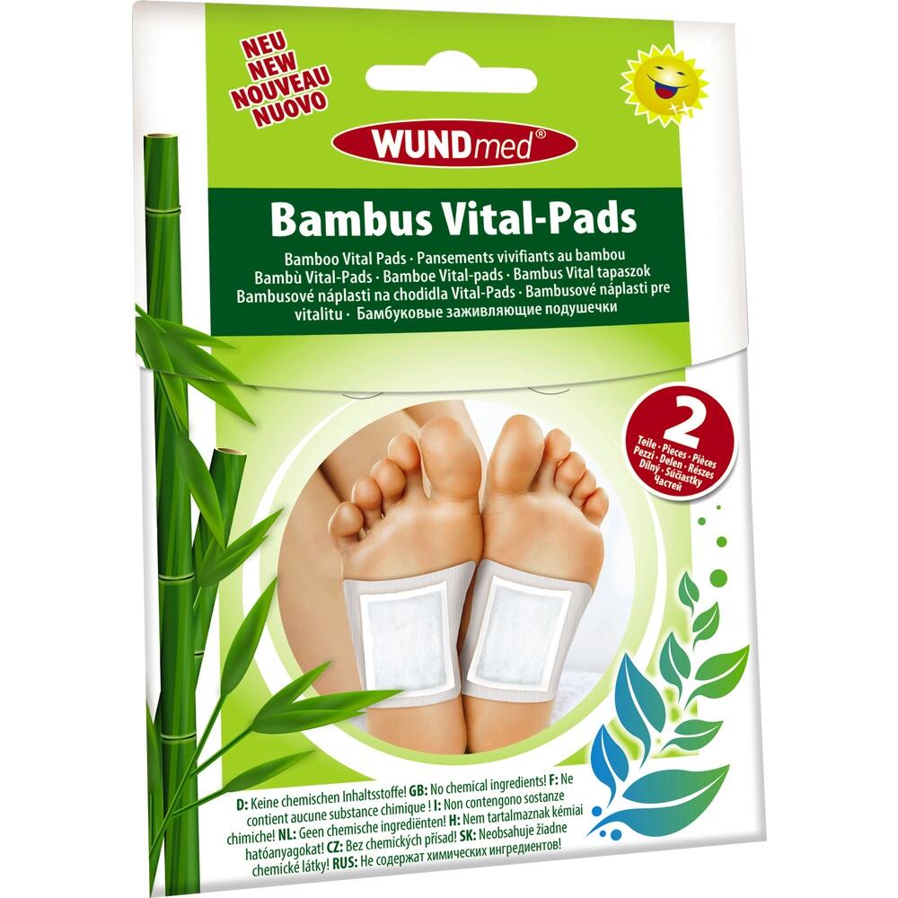 Verpackung mit Bambus Vital-Pads und Füßen, auf denen Pads kleben.