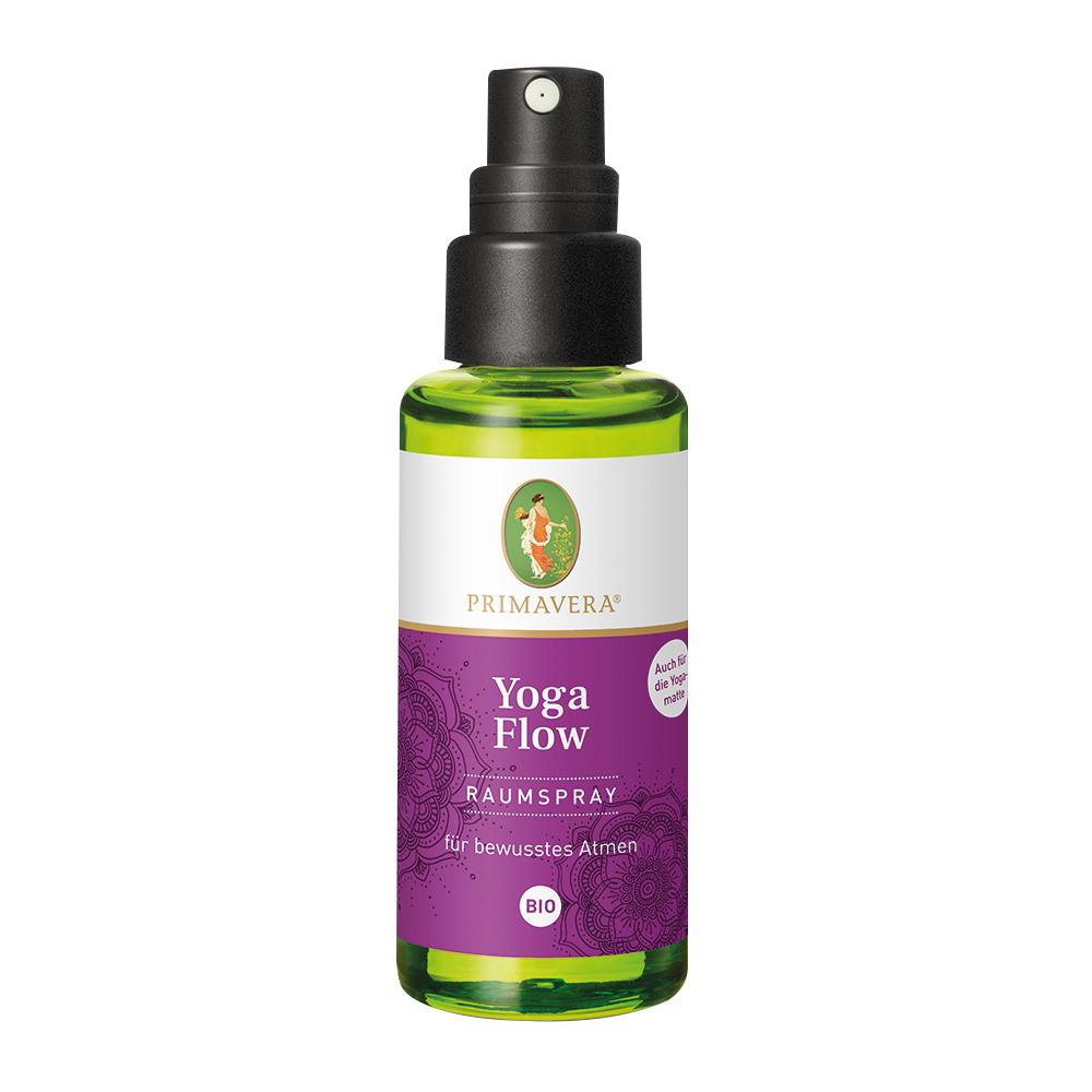 Eine gr&uuml;ne Flasche mit lila Etikett und der Aufschrift "Yoga Flow Raumspray".