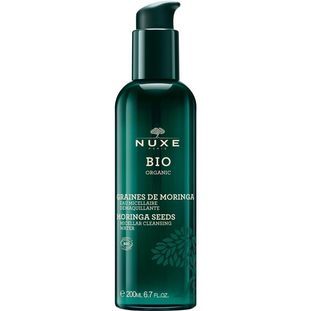 Dunkle Flasche mit Pumpspender und Aufschrift "Nuxe Bio Moringa".