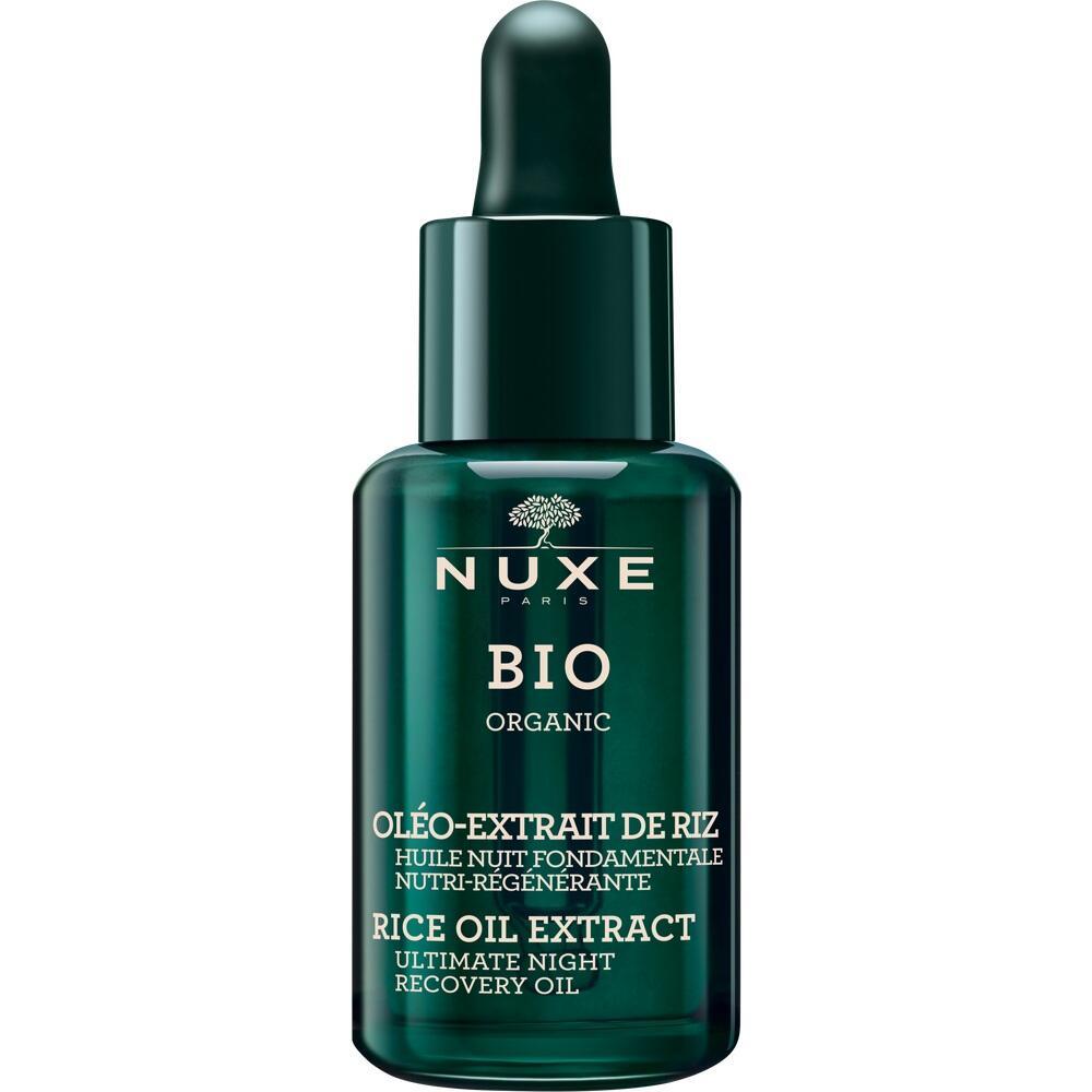Dunkle Flasche mit Pipette, auf der "NUXE BIO" steht.