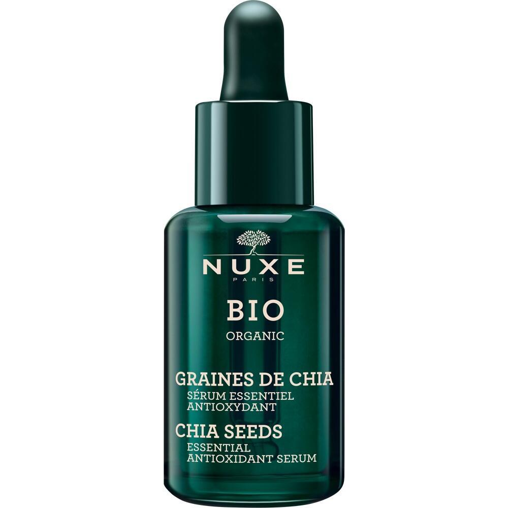 Dunkle Flasche mit Pipette, Aufschrift "Nuxe Bio" und "Chia Seeds".