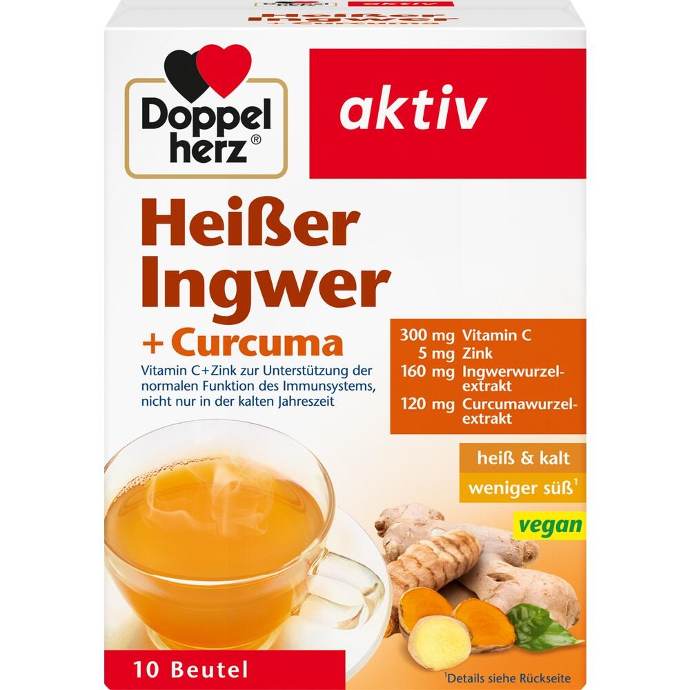 Eine Packung Doppelherz heißer Ingwer und Curcuma Tee mit Tasse und Ingwerstücken.
