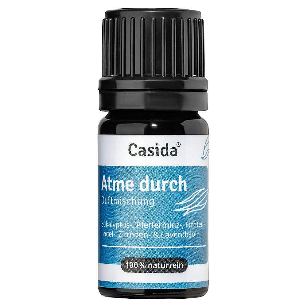 Kleine Flasche mit &auml;therischen &Ouml;len und der Aufschrift "Atme durch".
