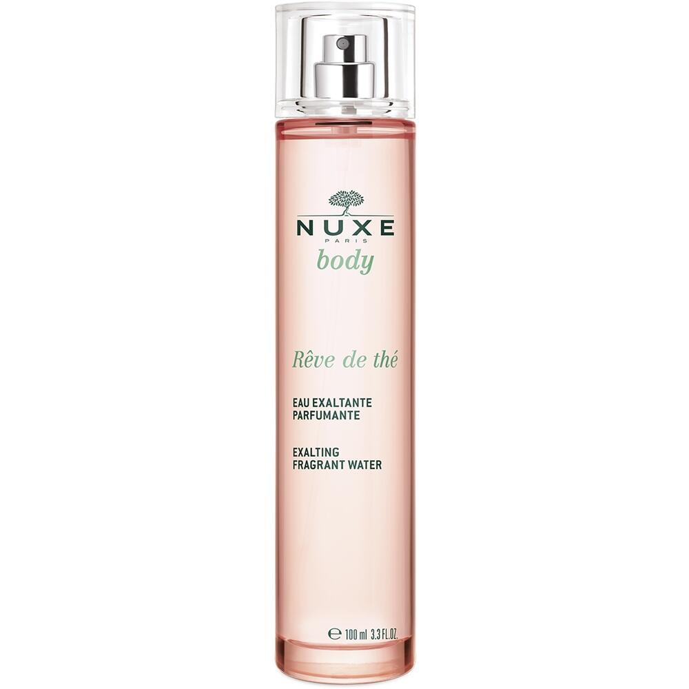 Rosa Flasche mit Parfüm von NUXE mit Sprühaufsatz.