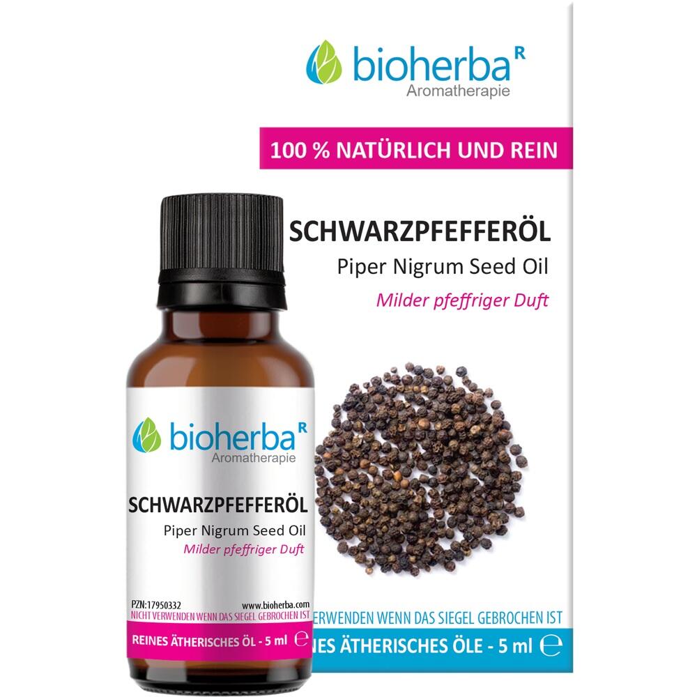 Braunes Fläschchen mit Schwarzkümmelöl und Pfefferkörner daneben.