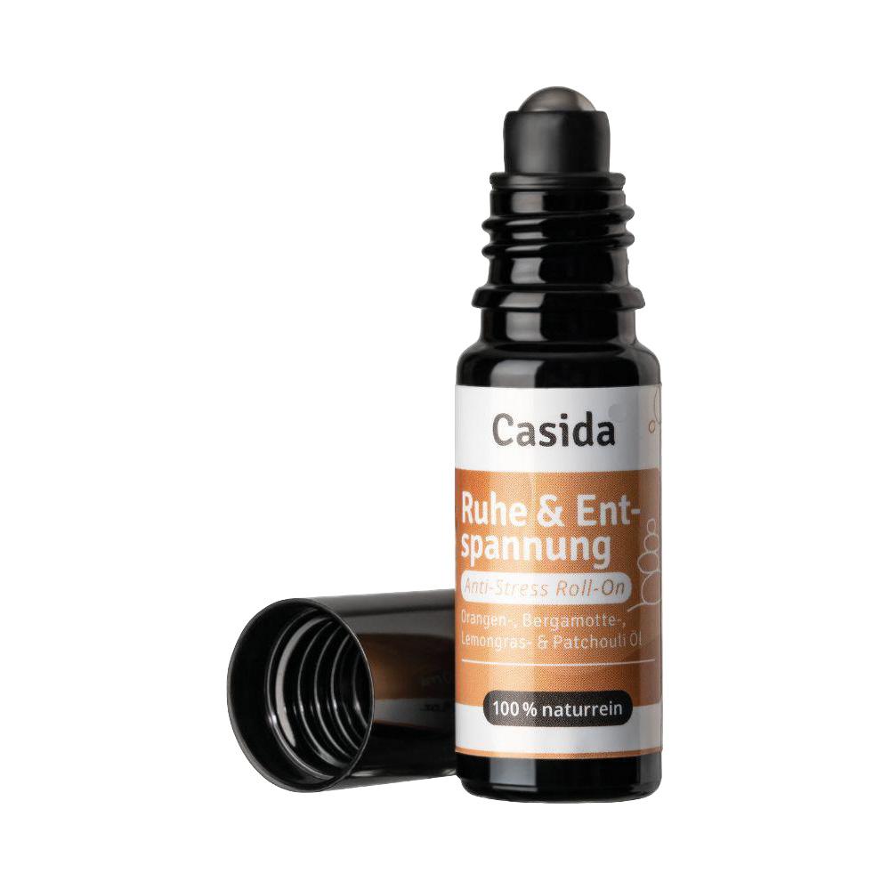 Schwarzes Roll-On mit orange-weißer Verpackung für Entspannung.