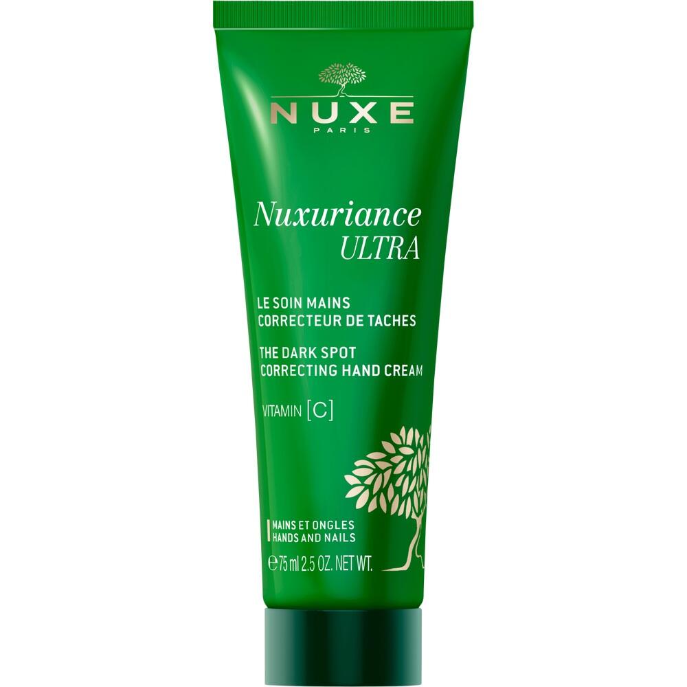Grüne Handcreme-Tube mit Text zu dunklen Flecken und Vitamin C.